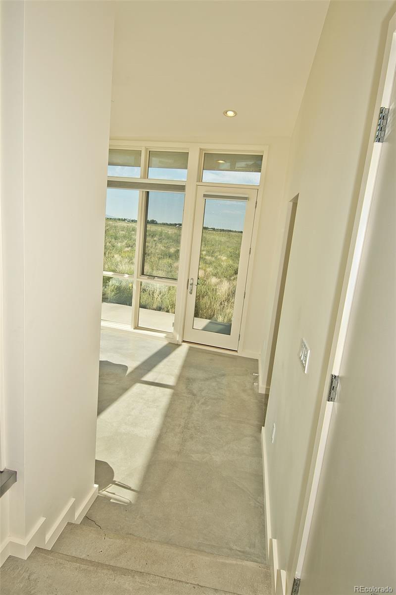 790 Birch Road Crestone, CO 81131 - Photo 17 of 38 a view of an empty room with a window