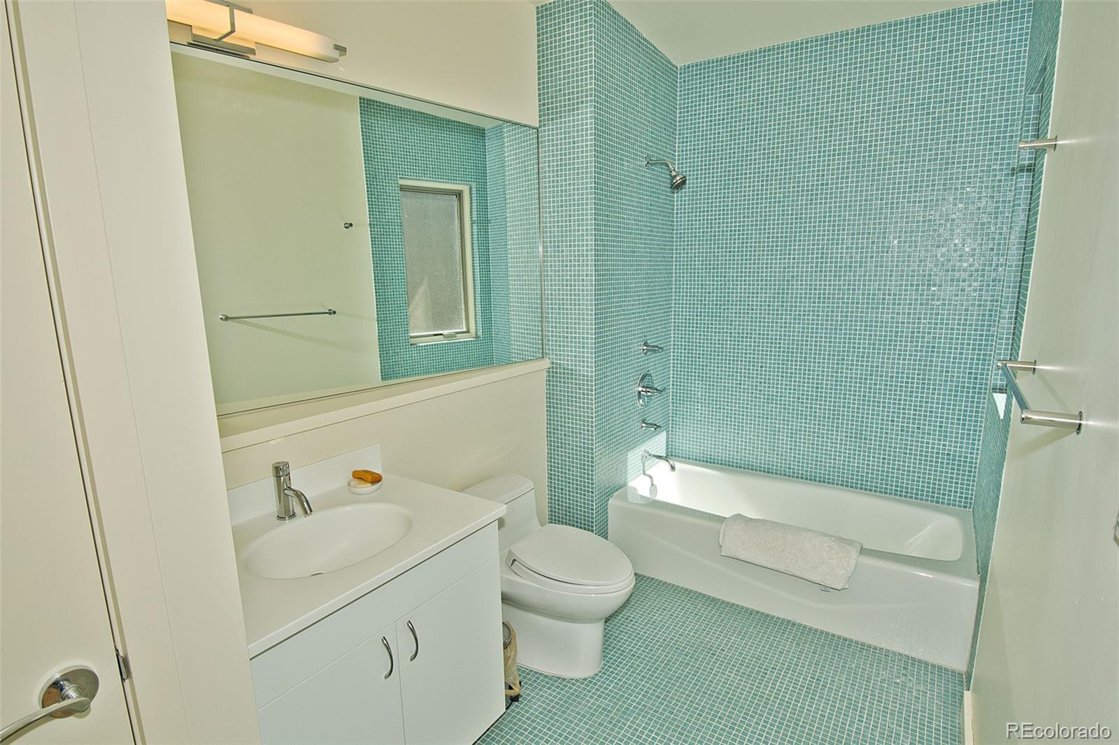 790 Birch Road Crestone, CO 81131 - Photo 27 of 38 a bathroom with a sink a toilet and shower