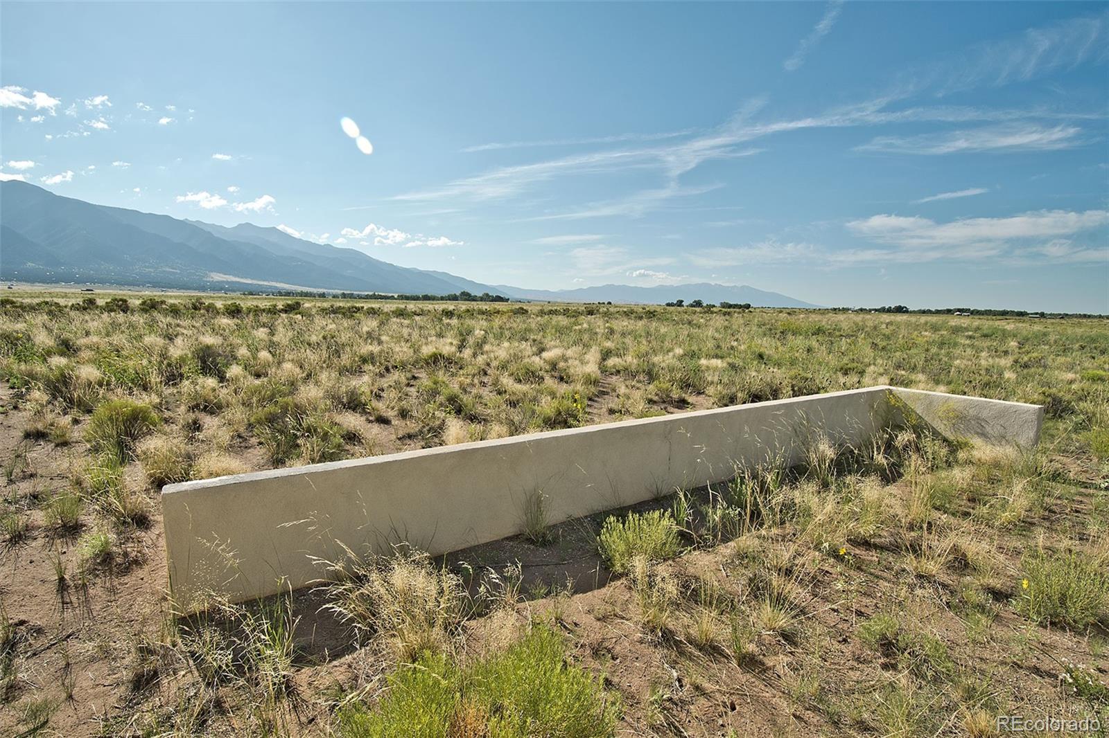 790 Birch Road Crestone, CO 81131 - Photo 10 of 38 view of outdoor space with large trees