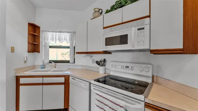 a view of a room with washer and dryer