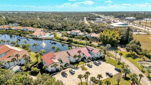 an aerial view of residential houses and outdoor space