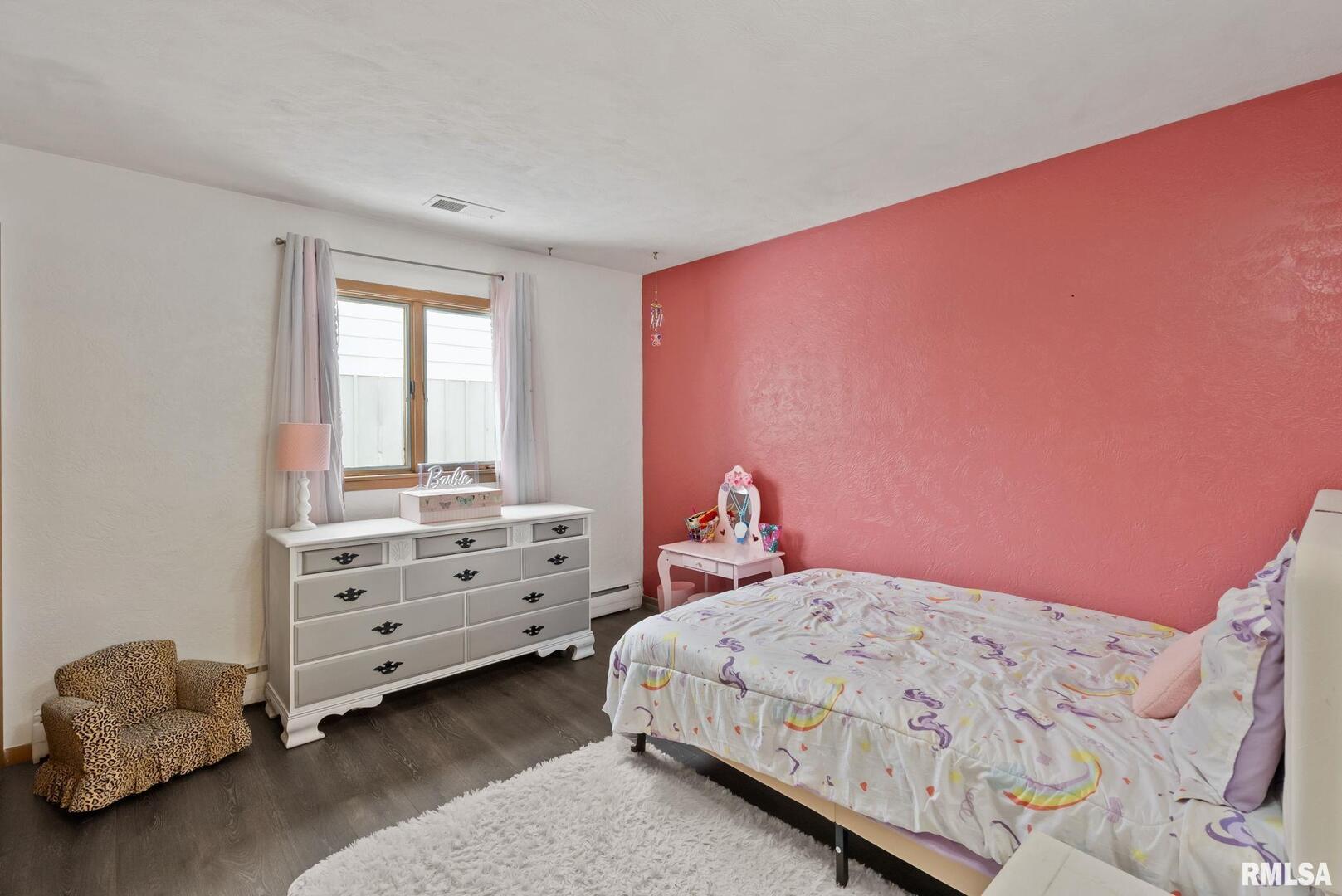 301 North Washington Street Atkinson, IL 61235 - Photo 27 of 45 a bedroom with a bed and a window