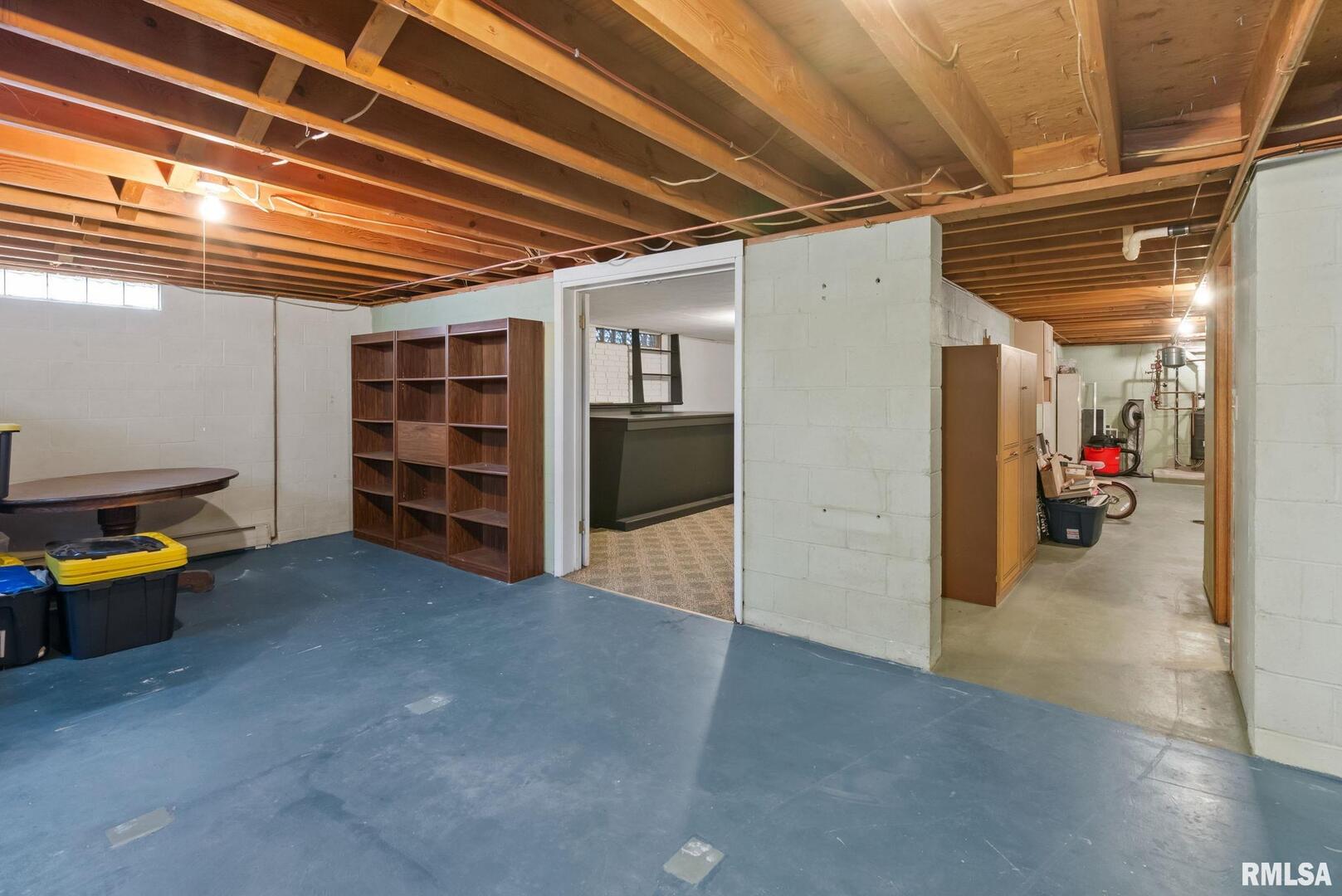 301 North Washington Street Atkinson, IL 61235 - Photo 34 of 45 a view of a storage room with stairs