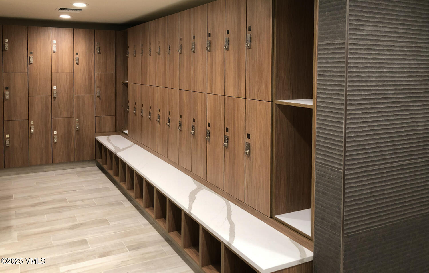 4650 Vail Racquet Club Drive, Unit 21 Vail, CO 81657 - Photo 24 of 29 a hallway with wooden floor