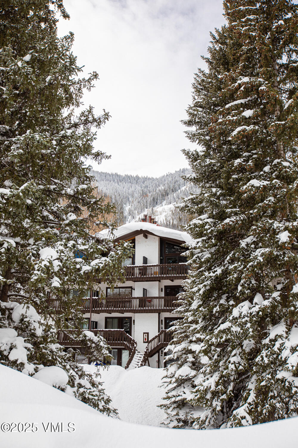 4650 Vail Racquet Club Drive, Unit 21 Vail, CO 81657 - Photo 29 of 29 a terrace with a city view