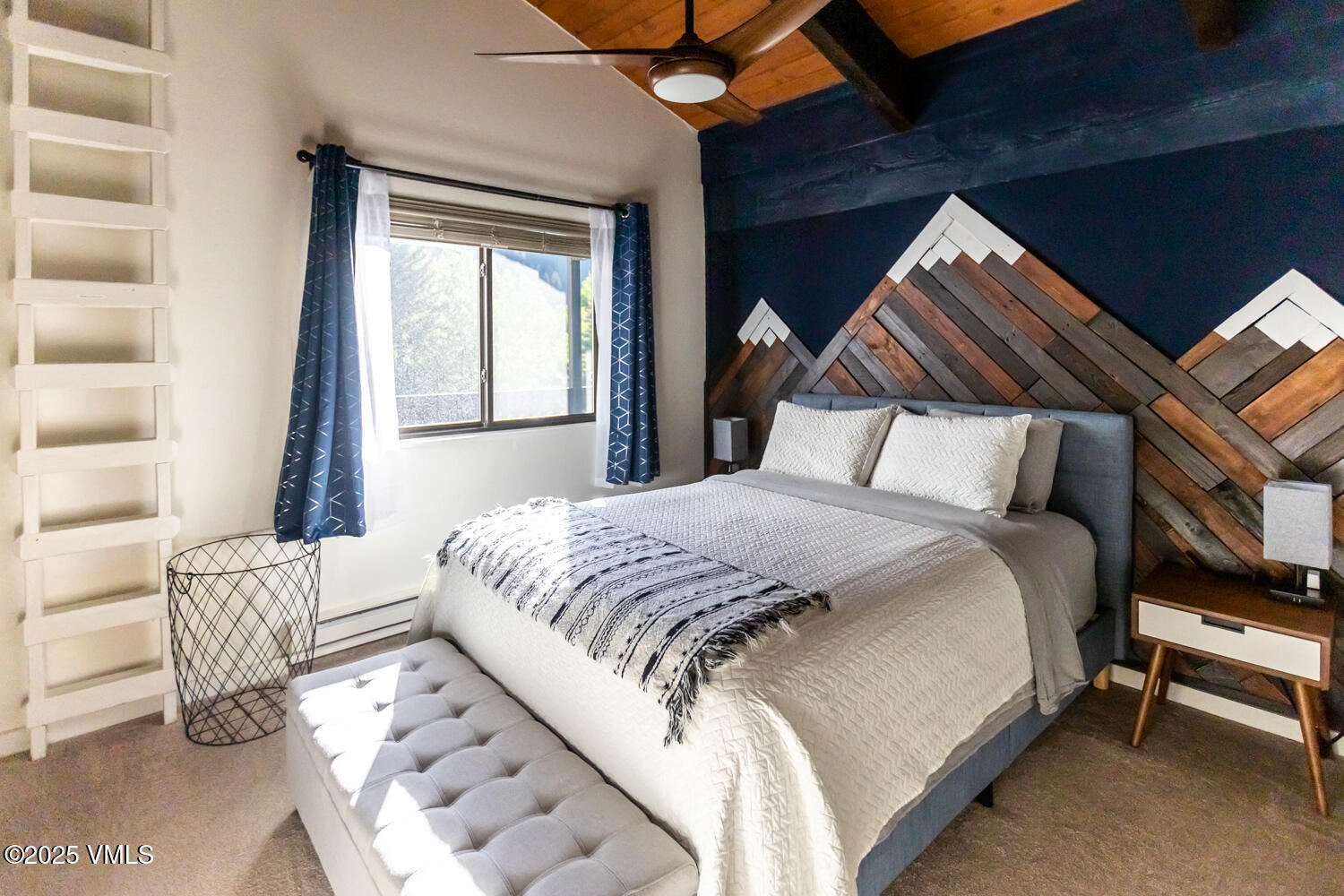 4650 Vail Racquet Club Drive, Unit 21 Vail, CO 81657 - Photo 8 of 29 a bedroom with a bed and a window