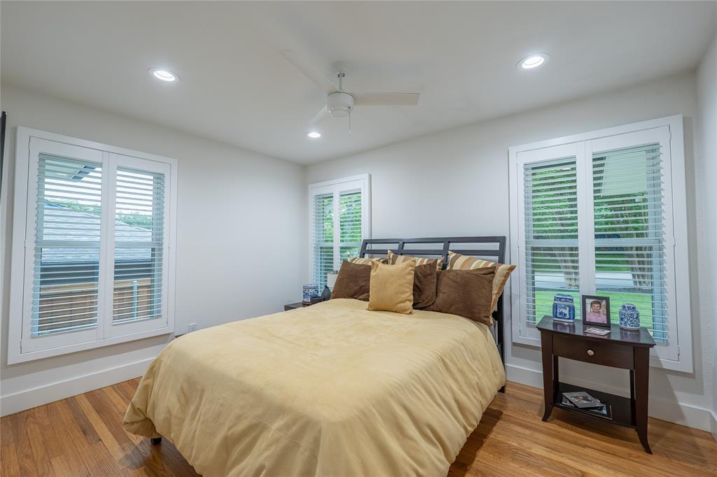 864 Peavy Road Dallas, TX 75218 - Photo 12 of 21 Bright interior space featuring wood-finish flooring, recessed lighting, and a ceiling fan