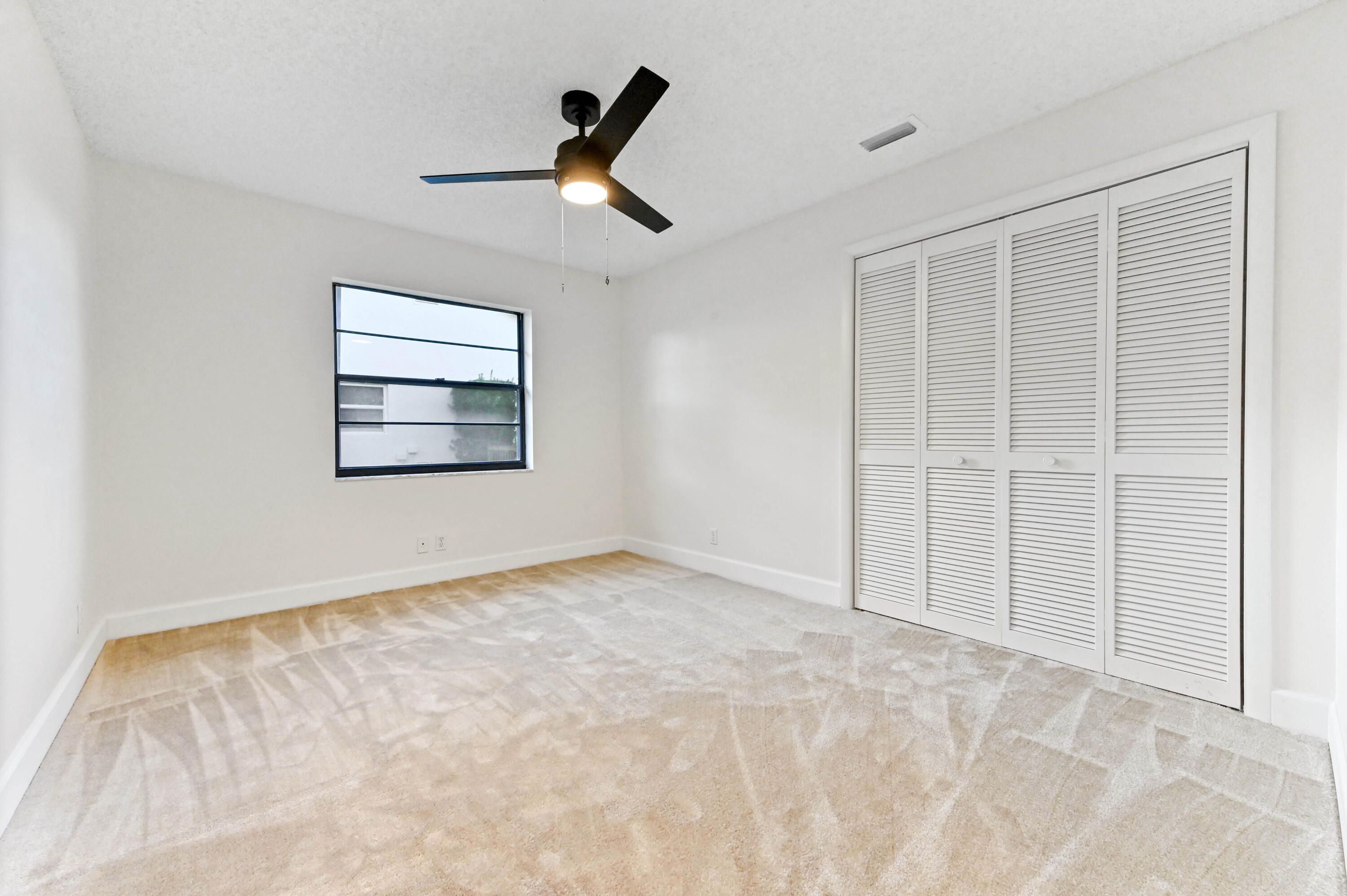 2581 Northwest 39th Street Boca Raton, FL 33434 - Photo 24 of 40 21 Bedroom 01