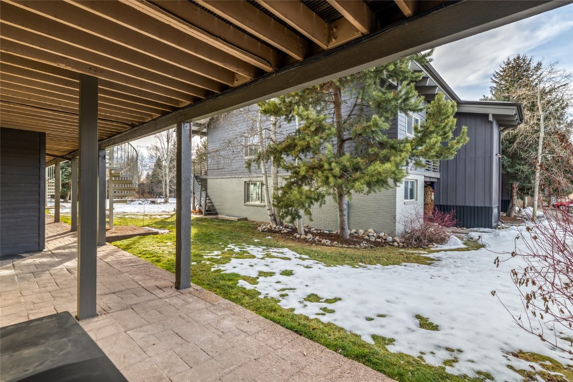 1375 Walton Creek Road, Unit 7 Steamboat Springs, CO 80487 - Photo 18 of 21 a view of a porch of the house