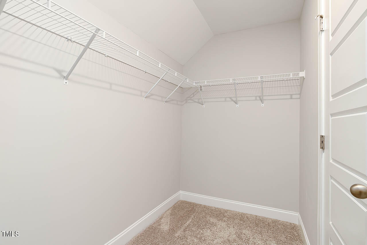 138 Rawhide Drive Spring Hope, NC 27882 - Photo 16 of 32 a view of a room with racks on the wall