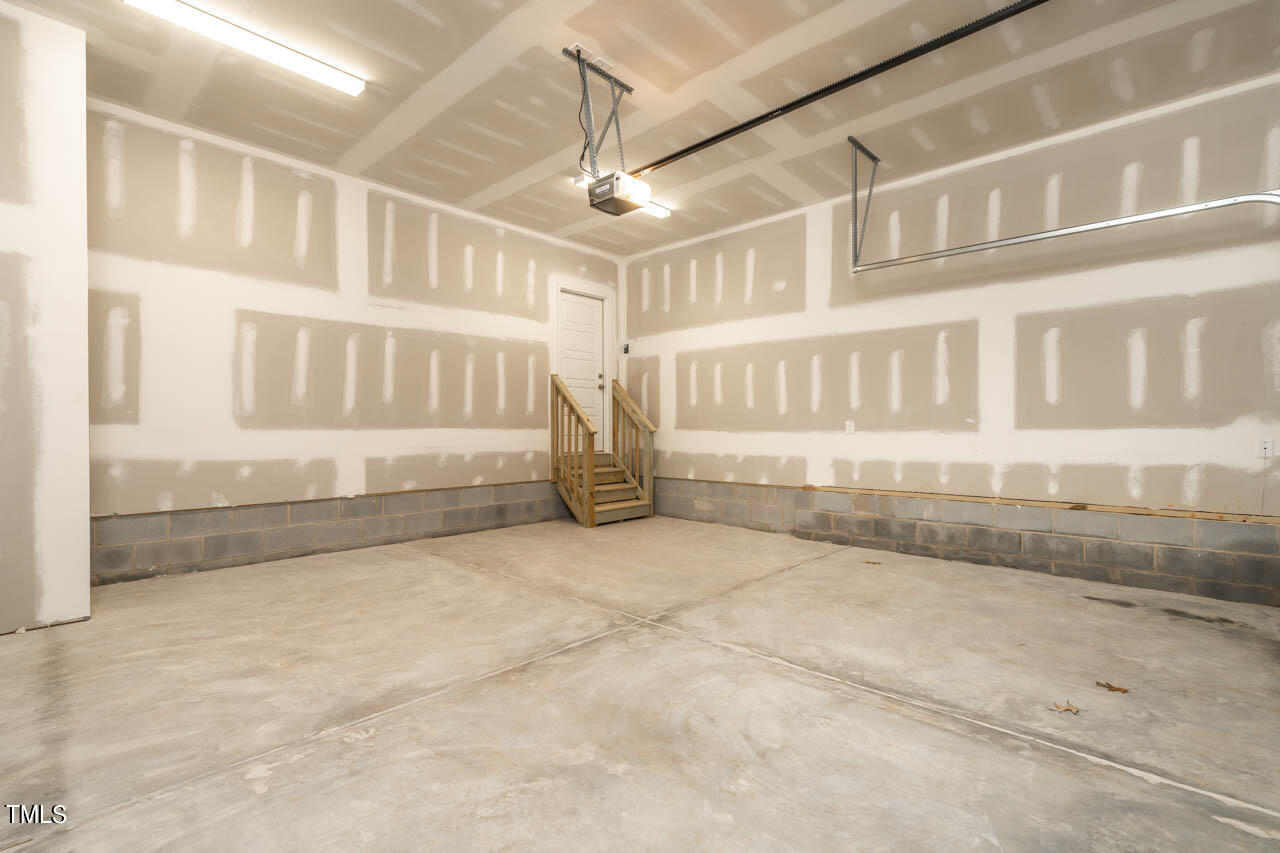 138 Rawhide Drive Spring Hope, NC 27882 - Photo 22 of 32 an empty room with windows