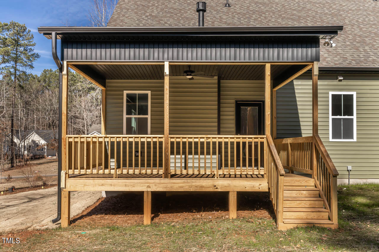 138 Rawhide Drive Spring Hope, NC 27882 - Photo 25 of 32 a view of a house with a wooden deck