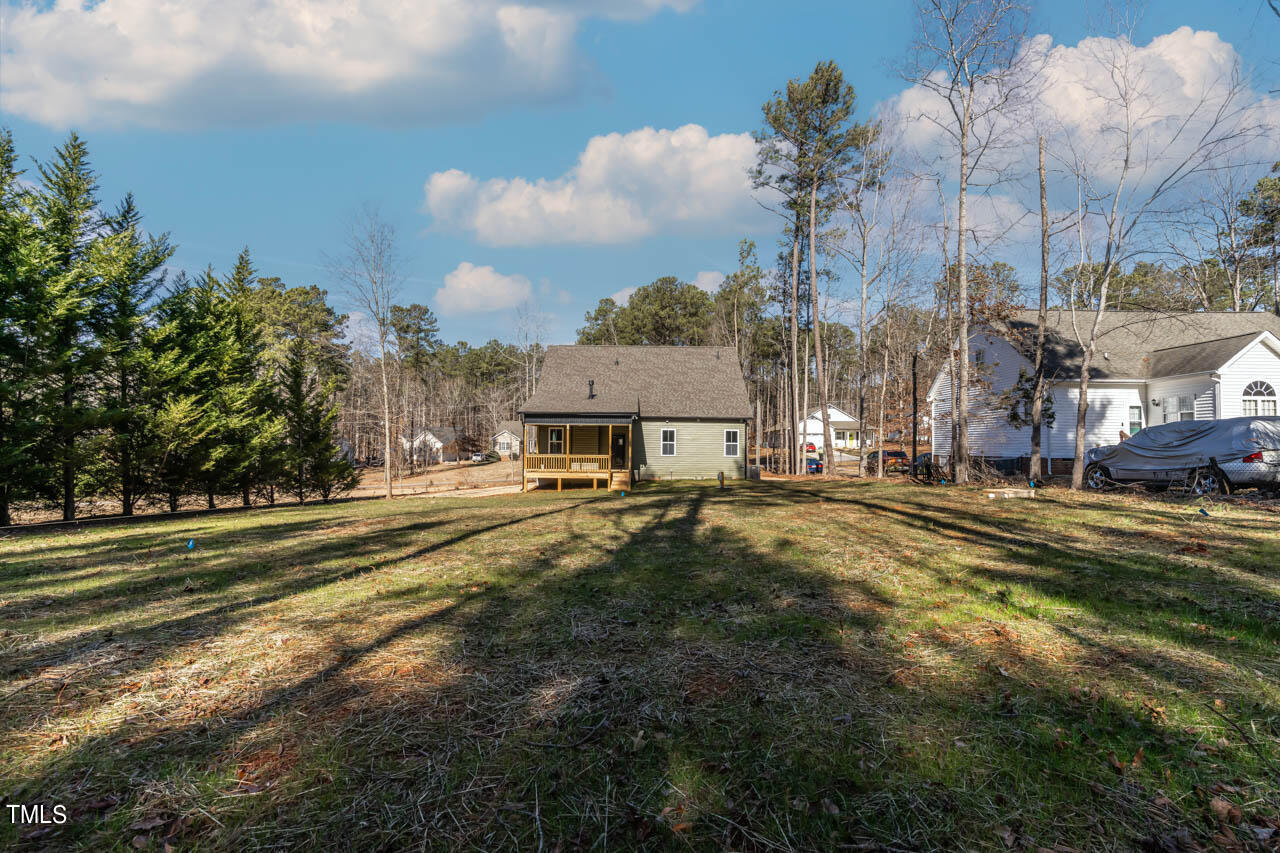 138 Rawhide Drive Spring Hope, NC 27882 - Photo 27 of 32 a view of a town with pool and trees