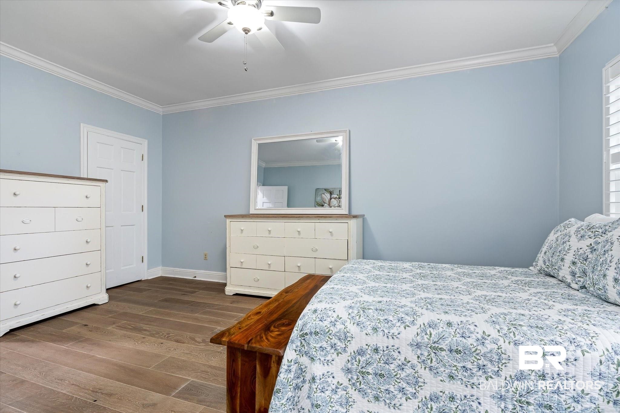 5324 Oak Bend Court Mobile, AL 36609 - Photo 27 of 49 Bedroom with crown molding, wood finished floors, ceiling fan, and baseboards