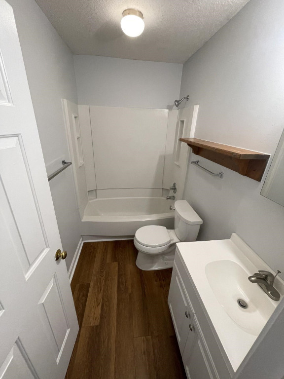 Undisclosed Address Raleigh, NC 27606 - Photo 12 of 14 a bathroom with a sink a toilet and shower