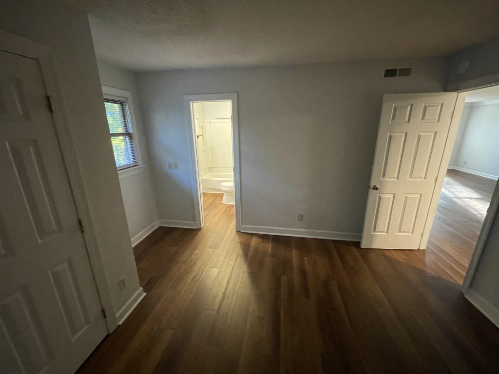 Undisclosed Address Raleigh, NC 27606 - Photo 8 of 14 a view of wooden floor in an empty room