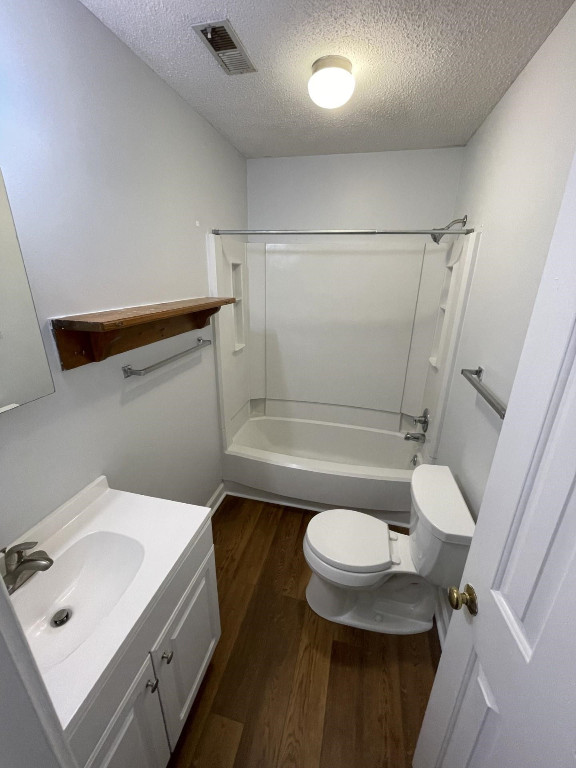 Undisclosed Address Raleigh, NC 27606 - Photo 9 of 14 a bathroom with a sink a toilet and shower