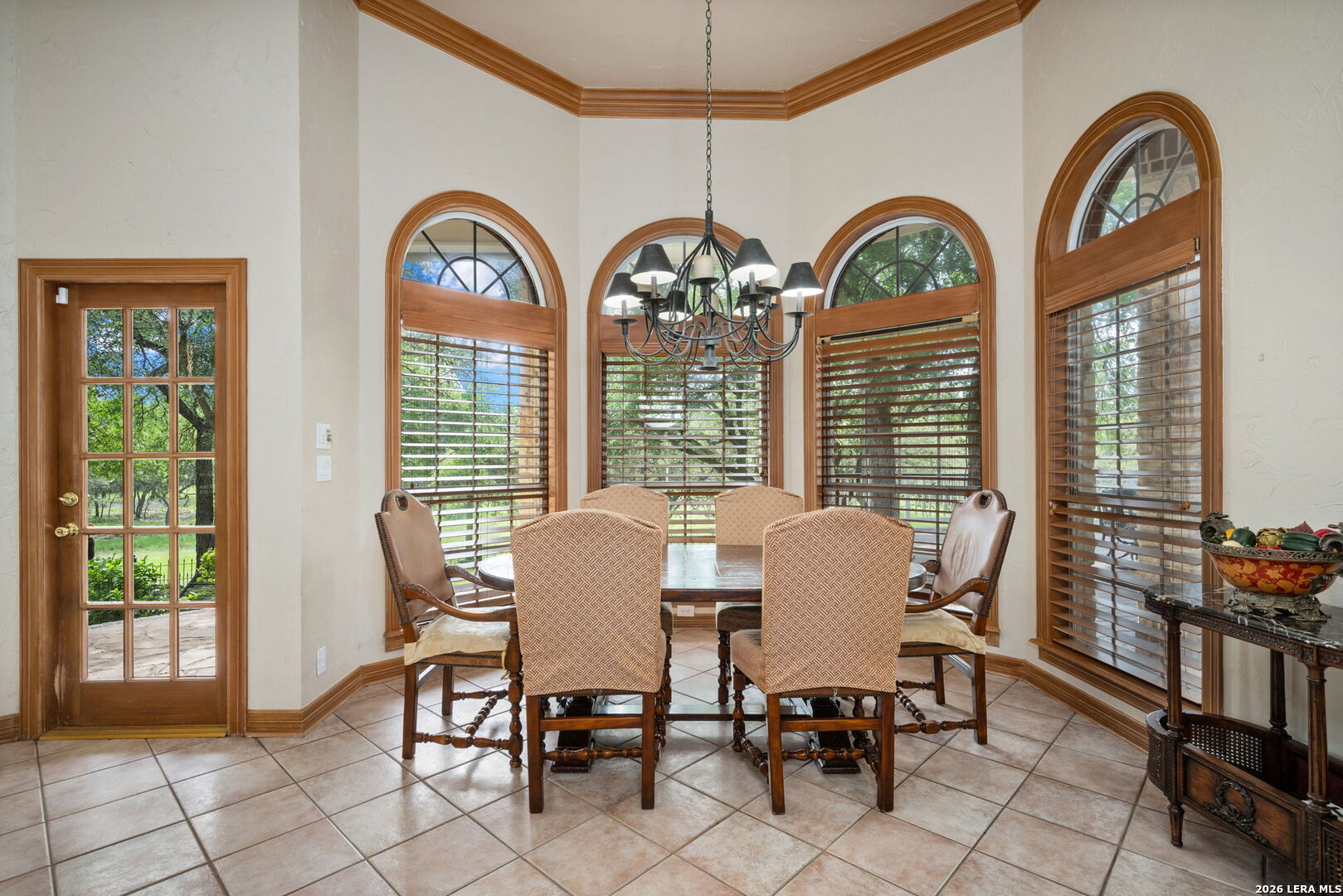 8040 Rolling Acres Trail Fair Oaks Ranch, TX 78015 - Photo 14 of 50 a view of a dining room with furniture window and outside view