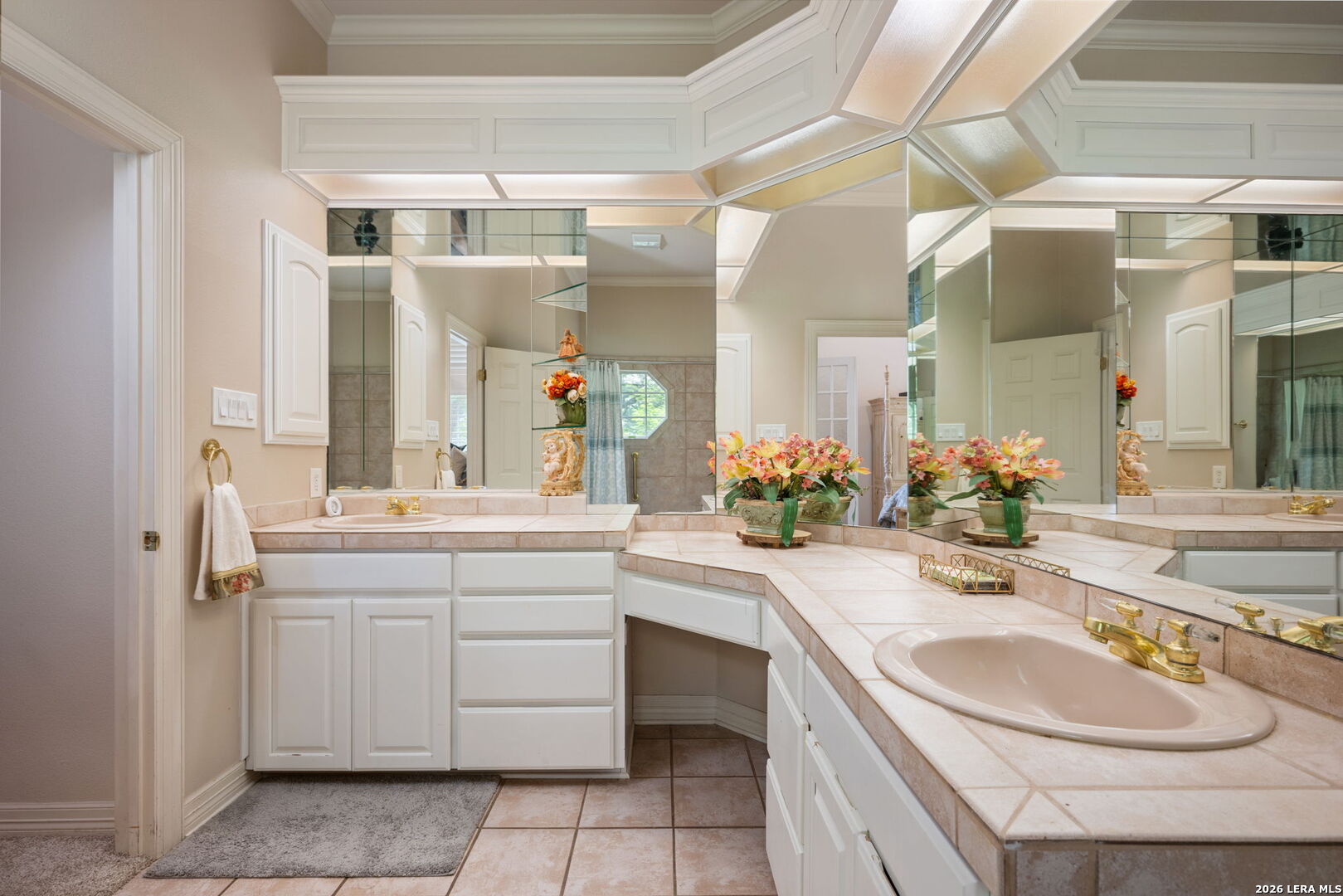 8040 Rolling Acres Trail Fair Oaks Ranch, TX 78015 - Photo 20 of 50 a bathroom with a sink and a mirror
