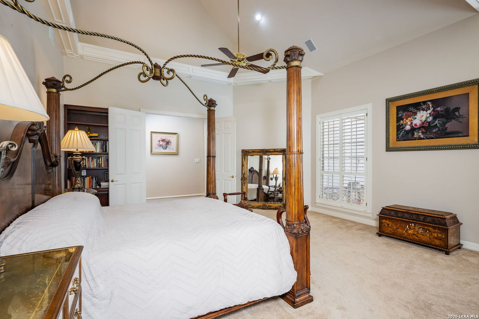 8040 Rolling Acres Trail Fair Oaks Ranch, TX 78015 - Photo 24 of 50 a bedroom with a bed couch and a window