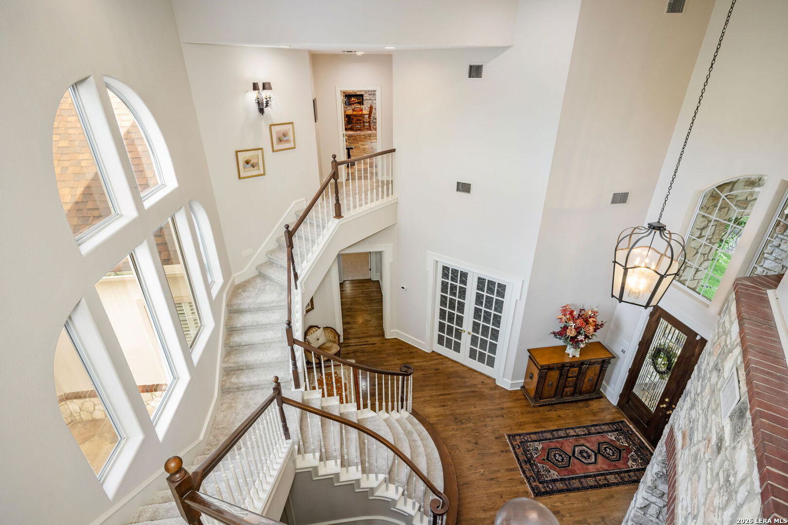 8040 Rolling Acres Trail Fair Oaks Ranch, TX 78015 - Photo 28 of 50 a view of an entryway with wooden floor