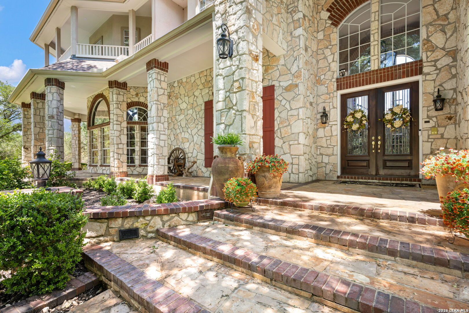 8040 Rolling Acres Trail Fair Oaks Ranch, TX 78015 - Photo 3 of 50 a view of a building with sitting area