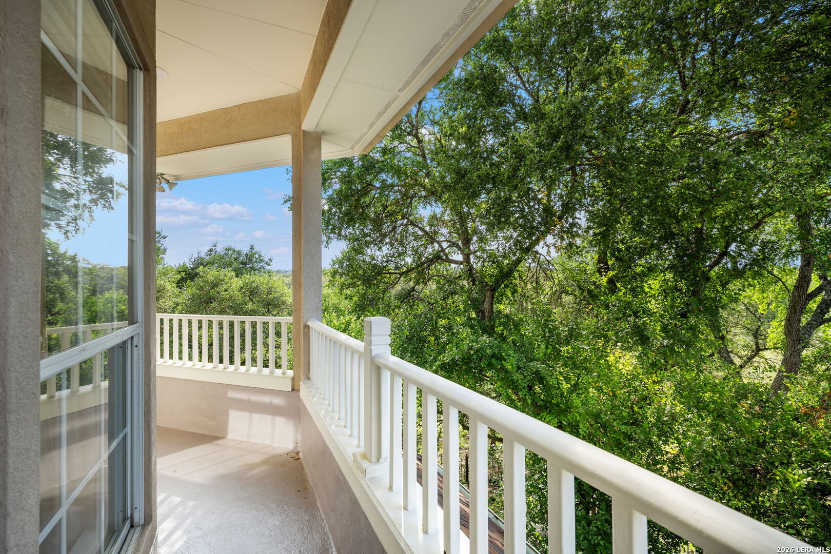 8040 Rolling Acres Trail Fair Oaks Ranch, TX 78015 - Photo 31 of 50 a view of a balcony with wooden floor