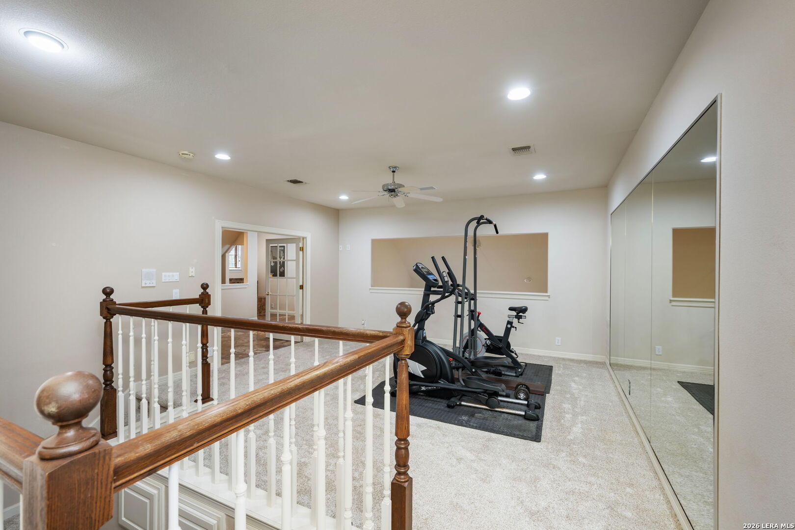 8040 Rolling Acres Trail Fair Oaks Ranch, TX 78015 - Photo 35 of 50 a view of a room with gym equipment