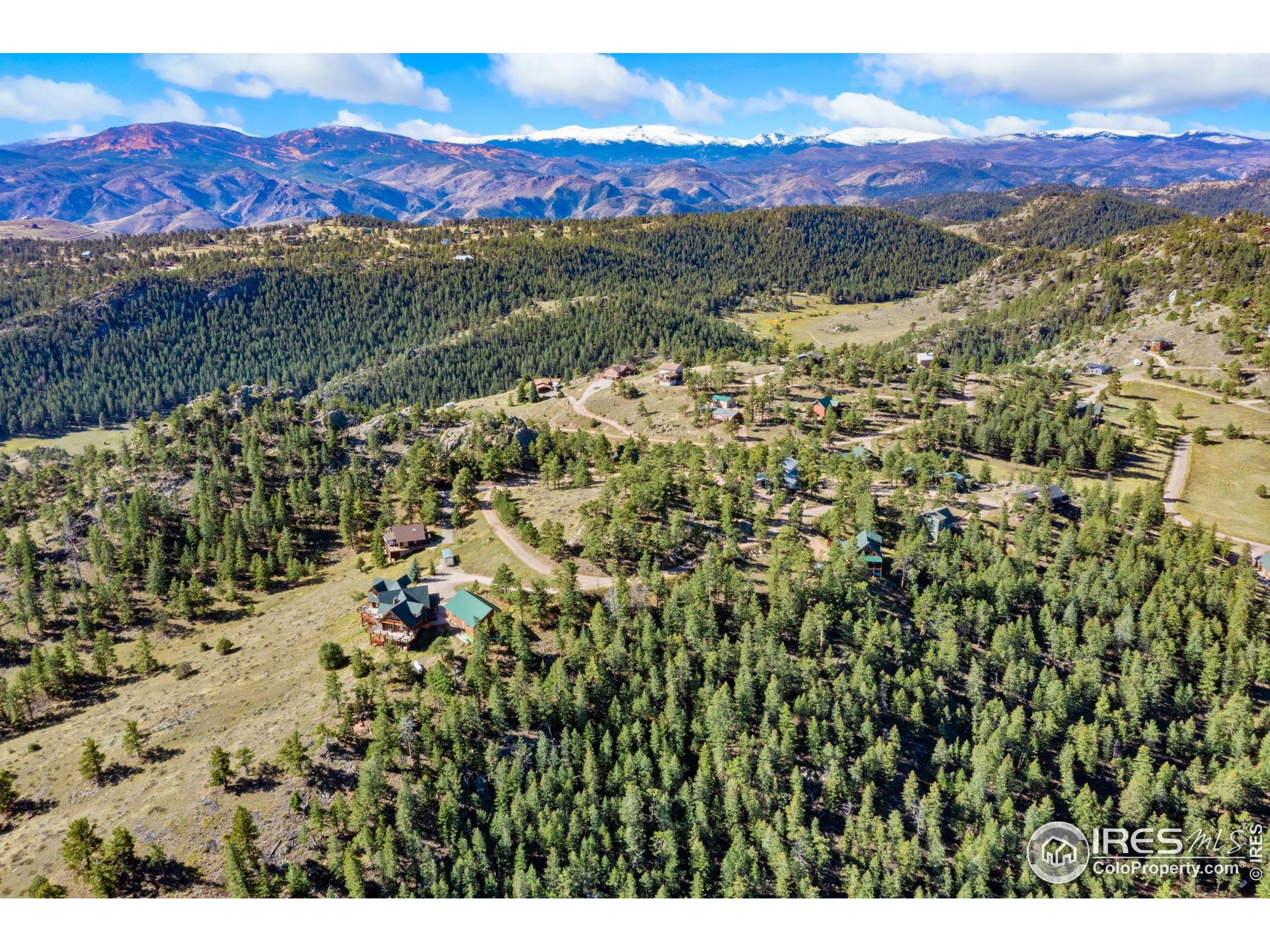 90 Sunlight Circle Livermore, CO 80536 - Photo 4 of 18 a view of a city with a mountain