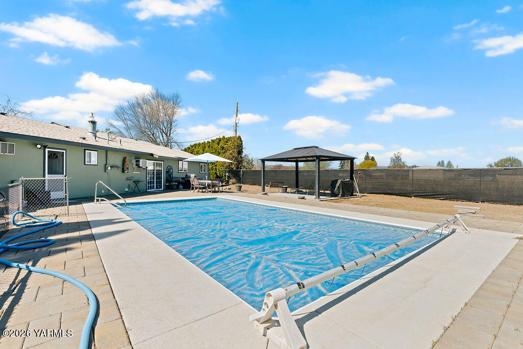 3003 South 79th Avenue Yakima, WA 98903 - Photo 24 of 32 a view of swimming pool with a lounge chair