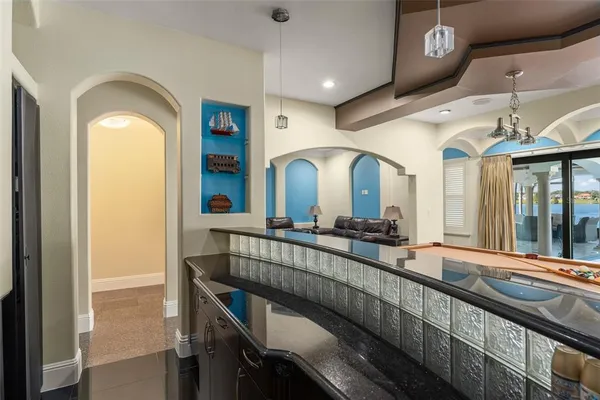 a stove top oven sitting inside of a kitchen
