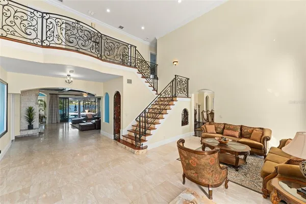 a view of a hallway with seating area