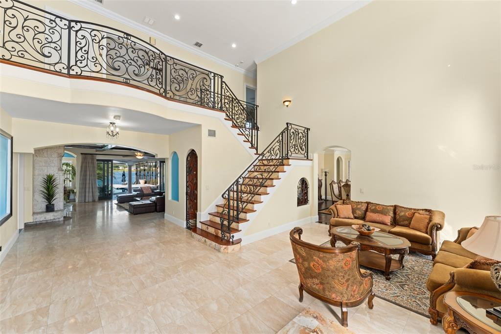 9575 Westover Roberts Road Windermere, FL 34786 - Photo 2 of 95 a view of a hallway with seating area