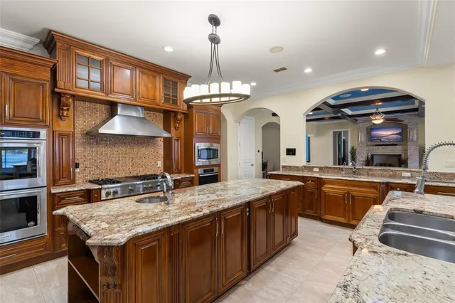 a spacious bedroom with a large bed and a window