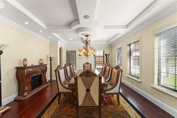 a view of workspace with wooden floor windows