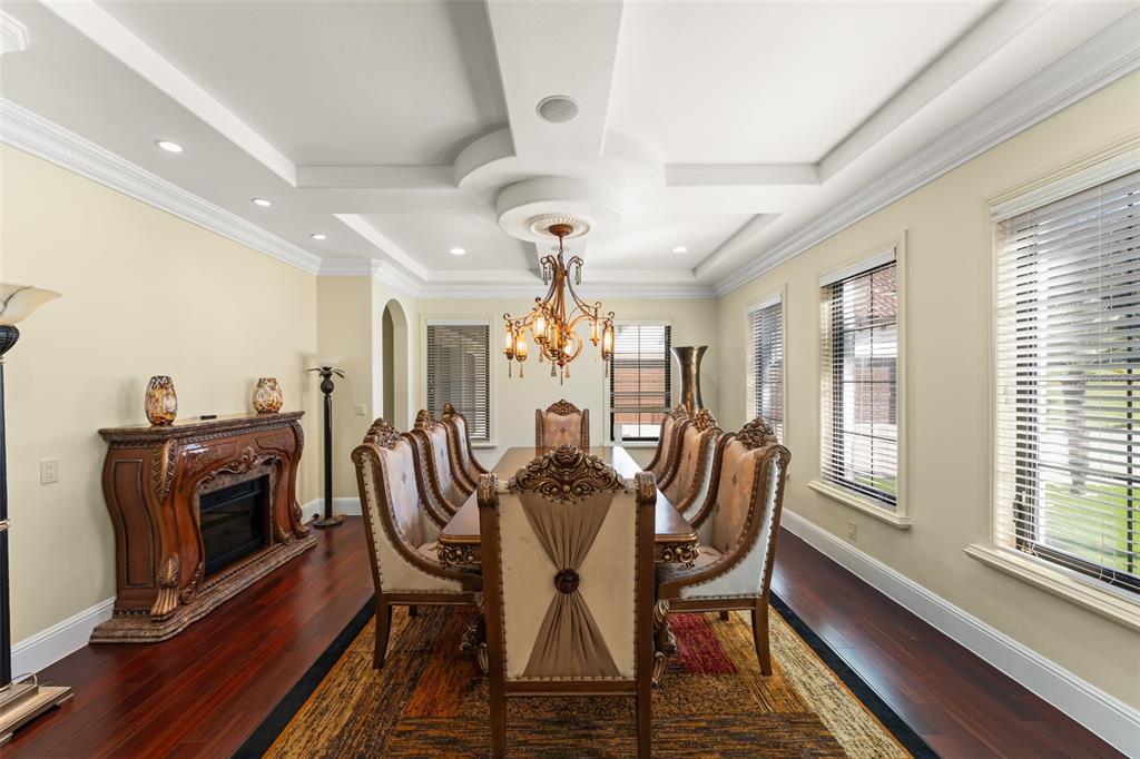 9575 Westover Roberts Road Windermere, FL 34786 - Photo 26 of 95 a view of a dining room with furniture window and wooden floor