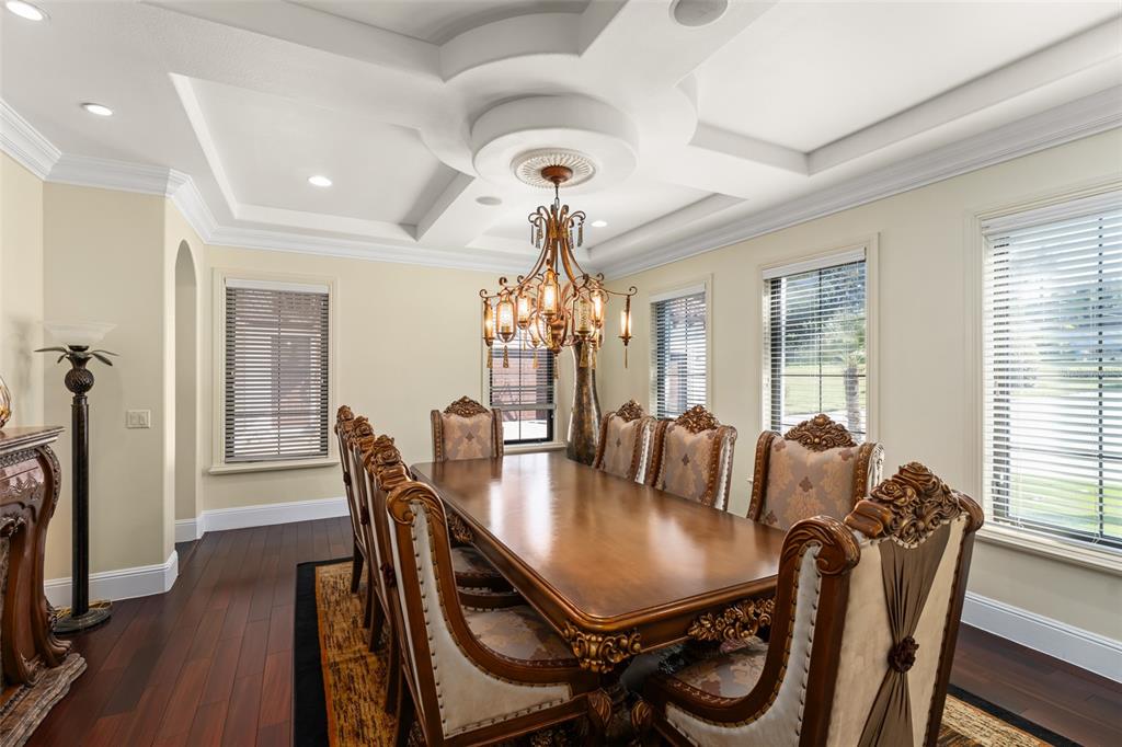 9575 Westover Roberts Road Windermere, FL 34786 - Photo 27 of 95 a view of a dining room with furniture window and wooden floor