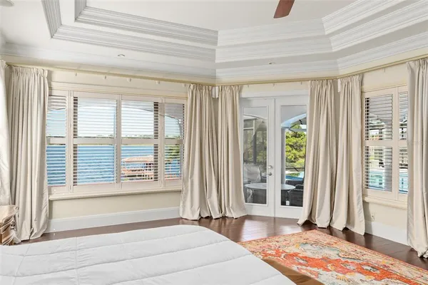 a bedroom with a bed and furniture