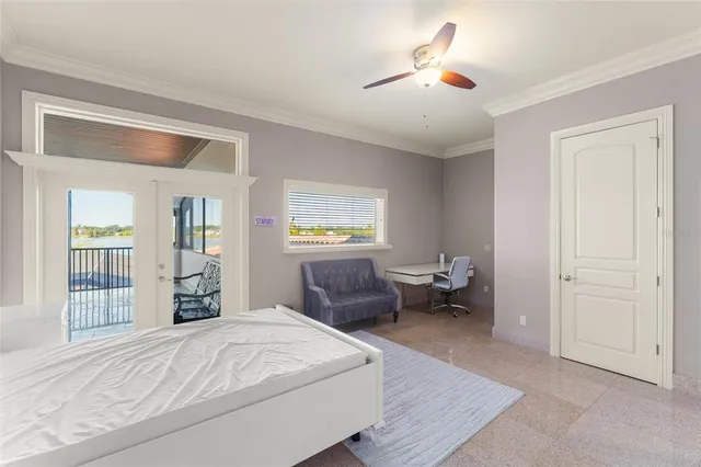 an aerial view of a house with swimming pool patio and outdoor seating