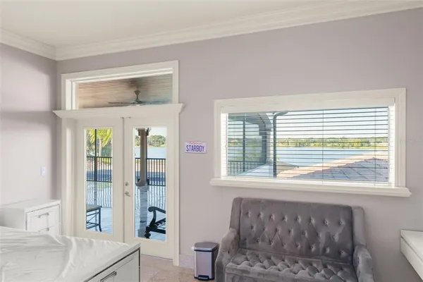 an aerial view of a house with yard swimming pool and outdoor seating