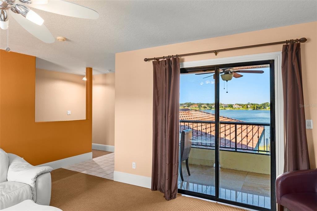 9575 Westover Roberts Road Windermere, FL 34786 - Photo 64 of 95 a bedroom with a bed and a window