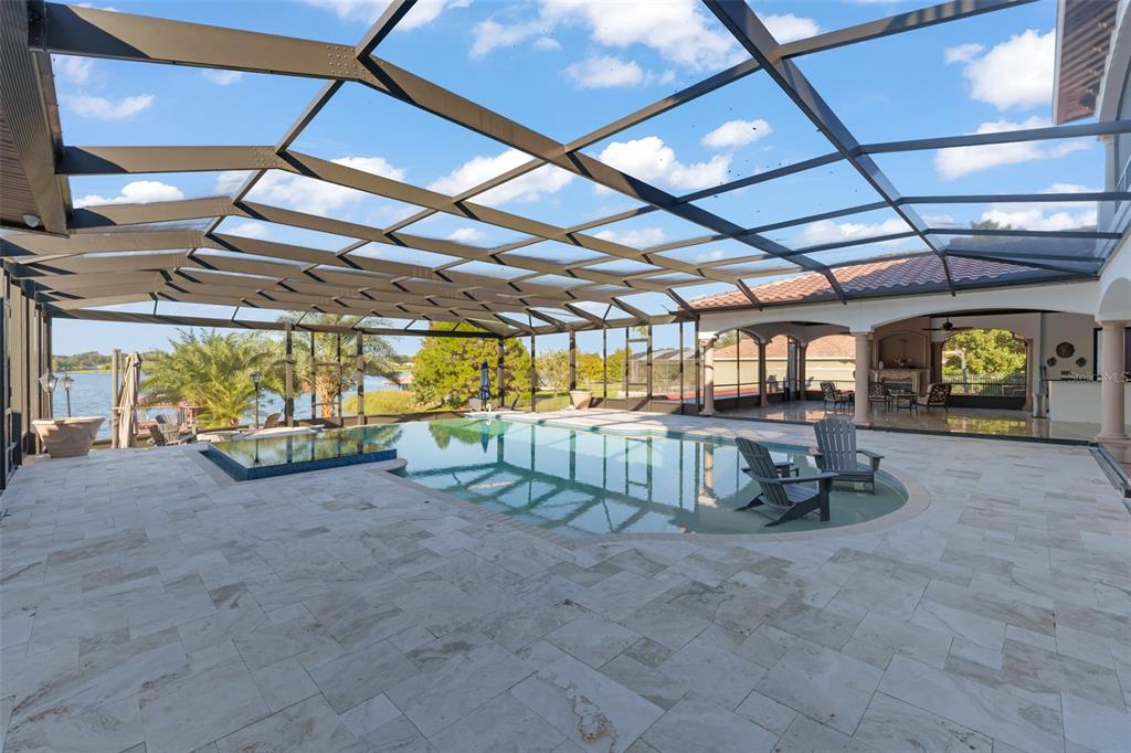 9575 Westover Roberts Road Windermere, FL 34786 - Photo 78 of 95 a view of a room with wooden ceiling