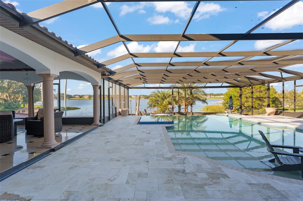 9575 Westover Roberts Road Windermere, FL 34786 - Photo 79 of 95 a view of a garage with wooden table