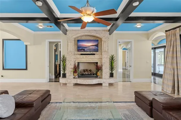 a large kitchen with a table and chairs