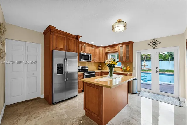 a bathroom with a sink mirror and toilet