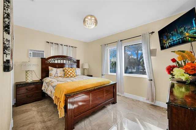 a view of a house with swimming pool yard and sitting area