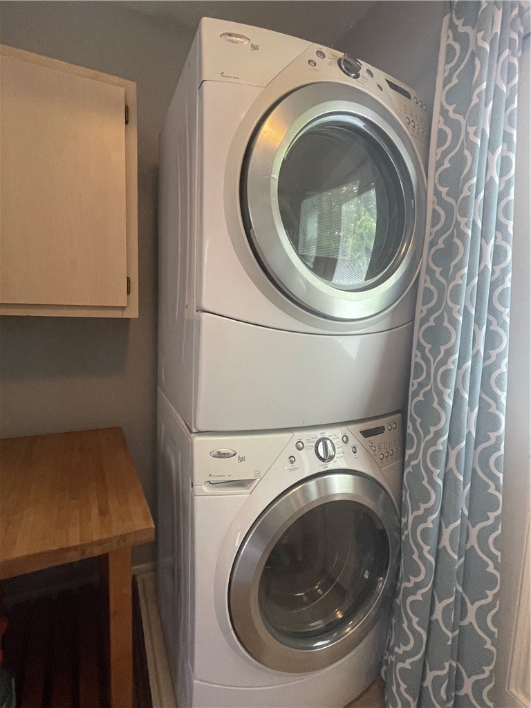 1041 Rosemont Street Austin, TX 78723 - Photo 10 of 13 a utility room with dryer and washer