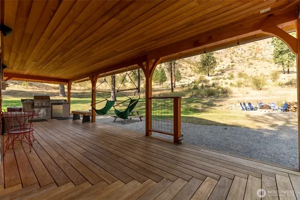 a balcony with wooden floor