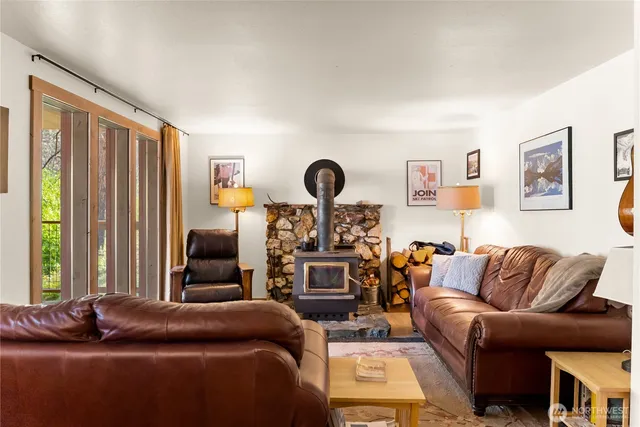 a bedroom with a bed and dresser