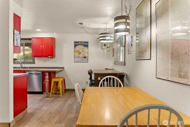 a view of a kitchen with washer and dryer